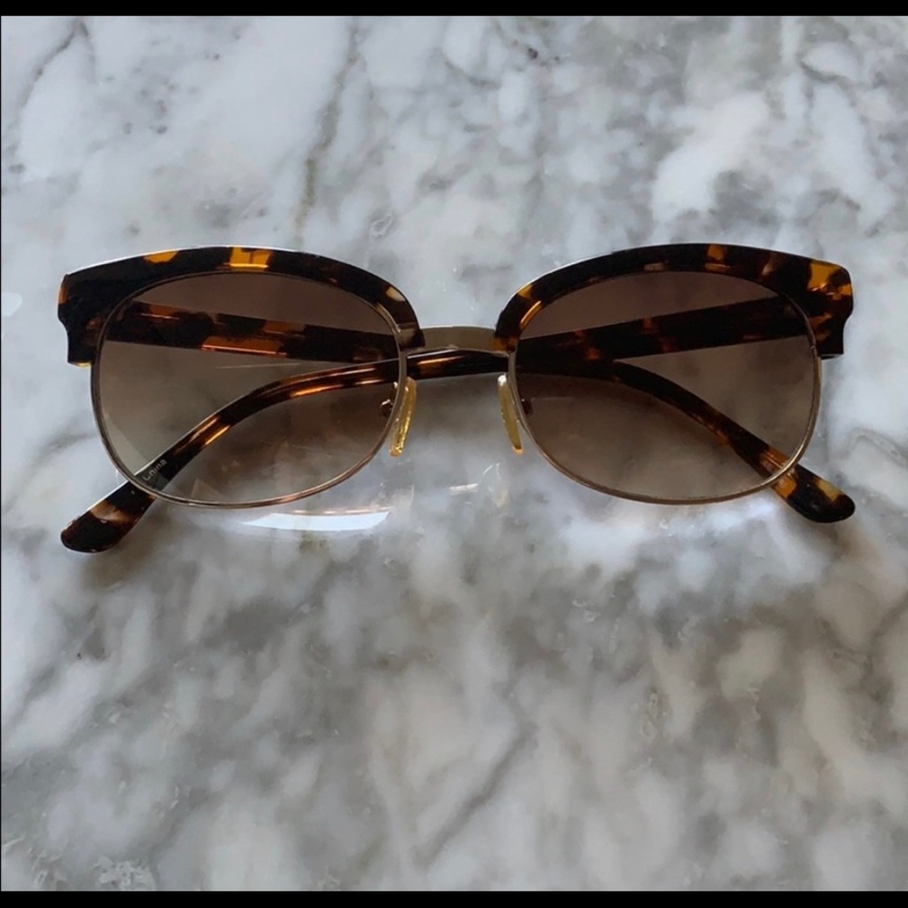 Half rimmed tortoise shell sunglasses